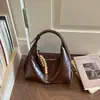 Elegante bolso pequeño para mujer, nuevo bolso de hombro de moda de verano 2026, versátil bolso cruzado de nicho