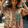 Nuevo top de manga tres cuartos suelto con estampado y cuello en V, estilo europeo y americano, para mujer, adecuado para uso casual, vacaciones y con un aire retro.