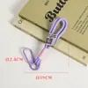 Llavero de cuerda para mochila, mosquetón tejido de nailon, cordón para bolsa, colgante de muñeca colorido, adorno de estrella, cuerda doble