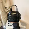 Bolso de mano con colgante de estrella estilo coreano, bolso de hombro versátil de alta gama para mujer de comercio exterior, bolso tipo bowling chic vintage
