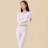Novo conjunto de roupa íntima térmica outono e inverno, com gola redonda, cores lisas e design combinando para casais, com forro quente de fleece e propriedades antibacterianas com aroma de lavanda.