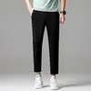 Ropa de Hombre Xintang 2026 Primavera/Verano Nuevos Pantalones Casuales Rectos Finos de Seda de Hielo, Sin Planchar, Anti-Arrugas, Pantalones Largos, Pantalones Cortos