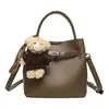 Bolsa de Mão Simples Transfronteiriça para Primavera e Verão Pequena Bolsa Tote para Mulheres 2026 Novo Estilo Bolsa Saco com Padrão de Lichia Versátil Bolsa de Ombro Transversal
