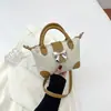 Bolso cruzado retro de gran venta transfronteriza para mujer, nuevo bolso versátil de moda de verano con textura para mujer con lazo, bolso cuadrado pequeño