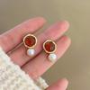 Pendientes de flocado con pasador 925 para mujer, otoño e invierno, nuevos pendientes de nicho de lujo elegantes y ligeros de cristal rojo de alta gama.