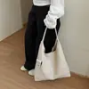 Bolso de axila grande de alta gama y moderno para mujer, nuevo bolso de hombro de moda 2026 con patrón tejido para el trabajo y para ir al trabajo