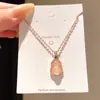Nuevo collar colgante de calabaza de resina con circonita estilo chino, sensación de lujo ligero y alta gama, cadena para la clavícula, accesorio versátil de moda y tendencia para mujeres