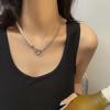 Collar de cadena de amor rosa con costuras de perlas de diseño de nicho para mujer, nuevo estilo, dulce y moderno, cadena de clavícula de alta gama.