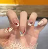 Las uñas cortas y portátiles más vendidas de Xiaohongshu: Puntas de Uñas Ojo de Gato con Lunares, Uñas Postizas Frescas y Lindas