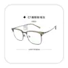 Al por mayor 5802 Nueva Moda Tendencia Montura de Gafas Ceja de Medio Titanio, Patillas de Titanio Súper Elásticas, No Pellizcan la Cara, Se Pueden Combinar con Graduación