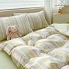 Juego de cuatro piezas de algodón puro estilo Mori Cubierta de edredón individual de algodón Ropa de cama Dormitorio Sábana de tres piezas Juego para las cuatro estaciones