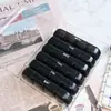 Fabricantes fornecem 2023 novo portátil 7 cores 7 dias por semana 28 caixa de remédios preta Amazon mais vendido dinheiro