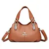Bolsa de alta qualidade e elegante para mulheres, coleção outono/inverno 2026, com design simples, múltiplos compartimentos, e pode ser carregada na mão ou usada como bolsa de ombro ou bolsa transversal.
