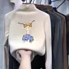 Nueva camiseta versátil de manga larga estilo coreano para otoño e invierno para niños, con cuello alto cálido y hecha de un tejido suave y cómodo