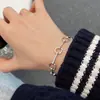 Popular Rosa Dulce Flor de Cuatro Hojas de Xiaohongshu Moda y Versátil Anillo de Gama Alta Ropa de Trabajo Diseño Diario Joyería para Manos