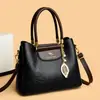 Bolso de mano de gran capacidad transfronterizo 2026 nuevo modelo para mujer, bolso grande de lujo ligero, bolso cruzado simple y elegante para el trabajo para mujer