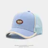 Gorra de béisbol para niños con etiqueta de cuero y letras, gorra de media malla de color caramelo para protección solar de bebé primavera/verano, gorra de pico de pato para niños, transfronterizo