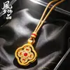 Joyería de colgante tradicional de trébol de cuatro hojas giratorio bañado en oro y con incrustaciones de diamantes, colgante de vajra de doble cara con incrustaciones de diamantes de nuevo estilo chino al por mayor