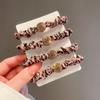 Corea del Sur Sense Titular 2023 Nuevo Estilo Anillo para el Cabello de Intestino Grueso Tendón de Goma para Mujer Cola de Caballo Bola Tocado Chaqueta de Cuero