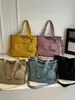 Bolso de Mano de Gran Capacidad de Moda Casual Transfronterizo 2025 Nuevo Bolso Tote de Nicho de Moda para Viajes Diarios y Comercio Exterior