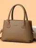 Bolso de mano vintage de cuero suave transfronterizo para mujer, nuevo modelo 2026, bolso de hombro y cruzado de moda de alta gama de gran capacidad