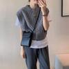 Diseño estilo coreano estilo perezoso suéter sin mangas trenzado otoño e invierno prenda exterior estilo occidental rejuvenecedor suéter tipo capa holgado moda