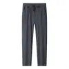 Pantalones Casuales para Hombre Primavera/Verano 2025 Delgados de Seda de Hielo Cuatro Pruebas Elásticos con Cordón Juventud y Edad Media Elásticos Anti-Arrugas Frescos Largos