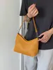 Bolso de axila de textura tejida de nicho estilo coreano transfronterizo para mujer, nuevo popular de verano 2026, bolso versátil de hombro y cruzado tipo bola de masa