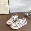 Zapatos de Lona de Caña Baja con Estrella para Mujer ins Tendencia Versátil Zapatos Blancos Verano 2026 Nuevos Transpirables Zapatos de Skate