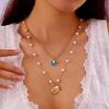 Collar de cadena de perlas de imitación con diseño de traje de estrella de mar de metal con viento oceánico de joyería transfronteriza europea y americana