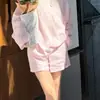 Conjunto feminino estilo minimalista, nova coleção verão 2026, conjunto de duas peças de alta qualidade com camiseta redonda casual de caimento solto e shorts modeladores