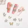 Joyería para Uñas Artísticas de Mariposa Hueca Nueva Tridimensional Transfronteriza Estrella de Cinco Puntas Diamante Uñas Artísticas Accesorios DIY Venta al por Mayor