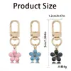 Colgantes de Flor de Cerezo de Cinco Pétalos de Colores de Venta Caliente Transfronteriza Accesorios para Llaveros de Bolsas de Regalo Navideños Directo del Fabricante