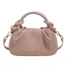 Bolso de mano vertical a rayas texturizado transfronterizo para mujer 2025 nuevo diseño de nicho moderno versátil hombro bandolera al por mayor