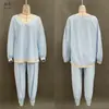 Moda Femenina Europea y Americana 2026 Nuevo Conjunto Suelto de Dos Piezas con Ribete de Encaje Rayas Azules y Blancas Traje Casual Pantalones de Pierna Ancha Manga Larga