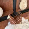 Bolso cruzado retro de nicho transfronterizo, nuevo bolso cruzado de moda para mujer otoño 2026 con lunares, bolso de hombro para el trabajo