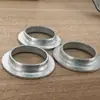 Producción al por mayor a largo plazo de piezas estampadas de ferretería, hechas a medida según planos, juntas de disco redondo, piezas de estiramiento, moldes, doblado de acero inoxidable