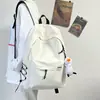 Mochila escolar para niños de secundaria, estudiantes de preparatoria y estudiantes universitarios; diseño simple y versátil; mochila unisex con un estilo minimalista y colegial