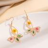Europa y Estados Unidos transfronterizo nueva moda forma de mariposa aretes de flor seca aretes joyería