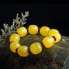 Pulsera de Cera de Abeja Ámbar de Segunda Generación Venta al por Mayor de Fábrica Ámbar Sangre Ámbar Flor Ámbar Medicina Pulsera de Cera Vieja Fluorescente Flotante Agua Salada