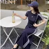 Traje de Verano Nuevo Coreano para Mujer Tallas Grandes con Efecto Adelgazante que Cubre el Vientre Estilo Preppy Top + Falda de Media Longitud Gris