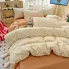 Conjunto Simples de Quatro Peças com Fio Bouclé Estampado - Coleção Primavera/Verão 2026