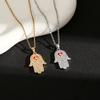 Collar de acero de titanio con forma de ojo de diablo transfronterizo europeo y americano para mujer, colgante de palma con incrustaciones de diamantes, joyería sencilla de mano Fama
