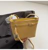 Bolsa de cubo nueva de estilo coreano para primavera y verano, nicho simple, patrón de lichi, bolsa cruzada casual para el trabajo, hebilla de cinturón distintiva, bolso para mujer