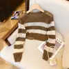 Suéter Tricot Vazado Estilo Coreano Novo Transfronteiriço para Mulheres, Peça de Exterior Fina de Verão com Proteção Solar e Detalhe de Corrente, Top Tendência