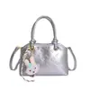Bolsa Pequena Quadrada Texturizada Estilo Japonês e Coreano para Mulheres 2026 Nova Bolsa de Ombro Transversal de Nicho Estilo Creme Bolsa Feminina Fofa