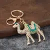 Llavero creativo de camello del desierto lindo y colorido con incrustaciones de diamantes y goteo de aceite, colgante de animal para coche, llavero, accesorio metálico