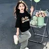 Ropa Infantil Degradada Verano 2026 Nueva Camiseta para Niñas Dibujos Animados Linda Casual Diaria Manga Corta Top Algodón Puro