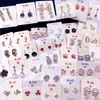 Marca Manzana Roja Sencillos Modernos Frescos de Alta Gama Aretes de Botón Aretes de Flor de Circonia Super Brillantes Microincrustados Aretes Transfronterizos