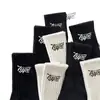 Calcetines Zhuji para Mujer Absorbentes de Sudor y Desodorantes Estilo Coreano Versátiles Tendencia ins Color Puro Letra Deportivos de Pareja Calcetines de Media Altura